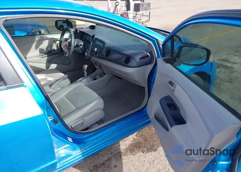 2010 Honda Insight Ex z USA, uszkodzony, nr VIN JHMZE2H71AS032904